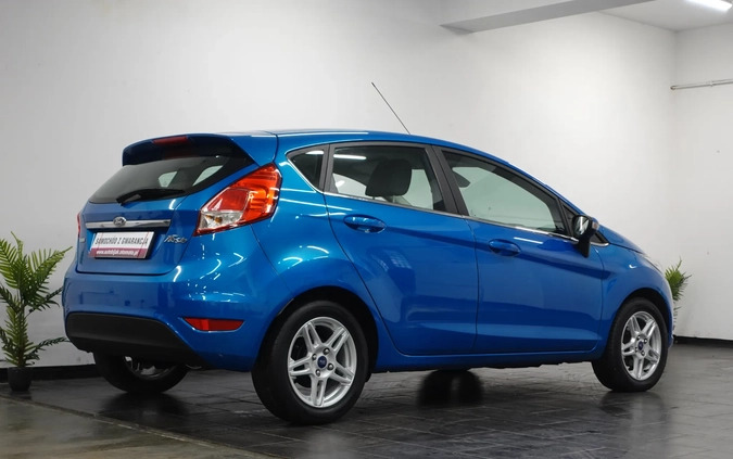 Ford Fiesta cena 26900 przebieg: 166556, rok produkcji 2013 z Wołów małe 781